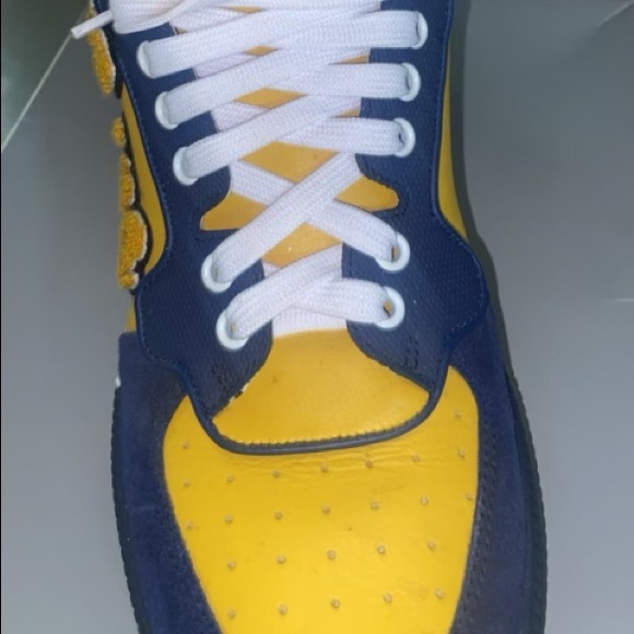 A Dolce Gabbana men sneakers .. size 8 .. color blue and yellow .